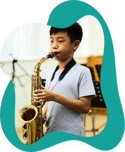 A beginner saxophone student learning proper posture and reading at our New Westminster music school.